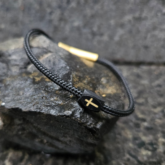 Cross (solid) · Paracord Single in Solaris: black paracord · black bead · gold cross · gold clasp